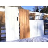 Two plank batten doors - one with suffolk latch; and two similar cupboard doors mounted with