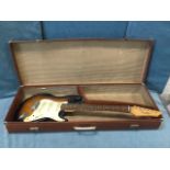 A cased Liberty 303 electric guitar with sunburst body, mother-of-pearl inlaid neck, chrome
