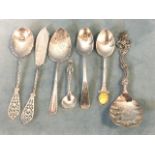 Seven hallmarked silver spoons and a butter knife - a Sheffield jam spoon, a Georgian engraved