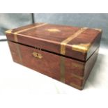 A Victorian rosewood writing box with brass military style mounts, the fitted interior with