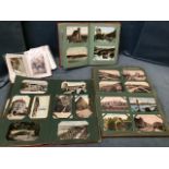 Three Edwardian postcard albums containing a large quantity of cards - topographical mainly