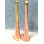 An English Made Victorian copper hunting horn with brass mounts and rolled rim; and another