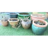 Seven miscellaneous garden pots - ribbed green glazed, terracotta, stoneware, fluted, crackle