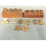 A box of miscellaneous military badges - 10th Royal Hussars, The Queens Lancers, Kings Royal Irish