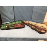 Two cased old violins - ripe for restoration, one in ebonised wood coffin box, each case with two