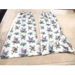 A pair of lined & interlined floral cotton curtains made by Whytock & Reid, printed with bands of