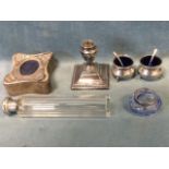Five hallmarked silver pieces - a Sheffield dwarf candlestick with urn shaped candleholder, a