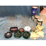 A box of pub ashtrays - Carlsberg, Grants, Cambrian, Vaux, Bells, etc; a quantity of pub glasses -