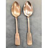 A pair of early nineteenth century hallmarked Scottish provincial silver dessert spoons of