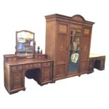 A late Victorian three-piece aesthetic style mahogany bedroom suite, the pieces all finely inlaid