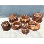 A collection of Victorian copper jelly moulds - rings, castellated, leaf moulded, tubular twisted,