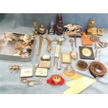 Two boxes of miscellaneous items including military buttons, a soapstone carved horse, bells,