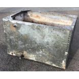 A rectangular galvanised tank of riveted construction with flat rims. (35in x 23.75in x 22.25in)