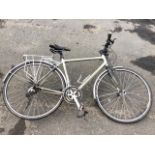 A Sirrus Elite Specialised bicycle with Shimano 8 speed gears, panier rack, carbon 2 forks, etc.