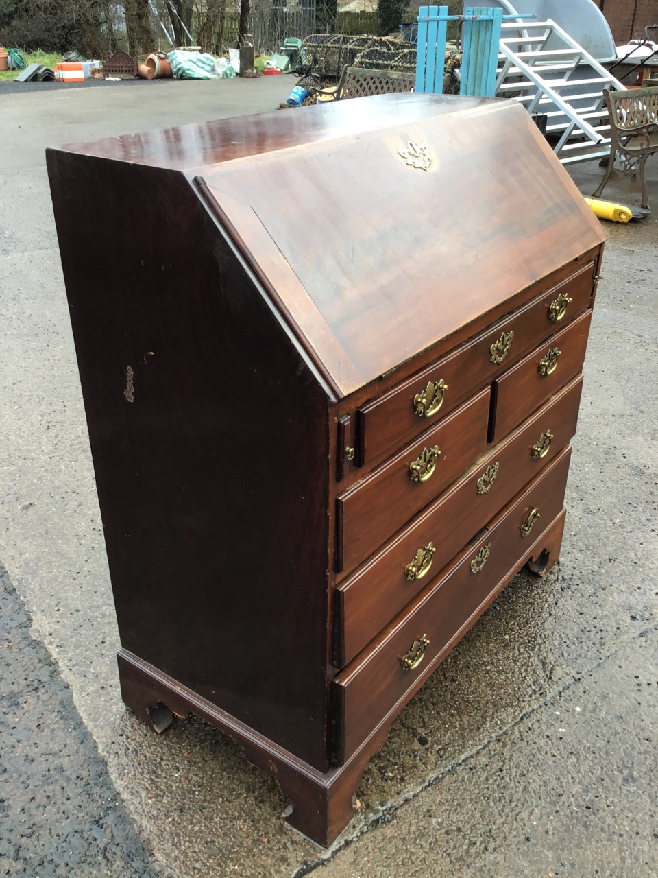 A George III mahogany bureau with cleated fallfront enclosing a fitted interior with drawers and - Image 3 of 3