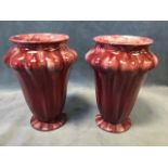 A pair of Pilkington Royal Lancastrian tapering lobbed vases with moulded rims and circular plinths,