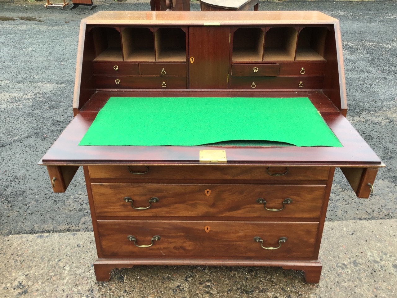 A George III style mahogany bureau, the moulded fallfront enclosing a fitted interior with central - Image 2 of 3