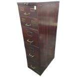 An unusual faux rosewood metal filing cabinet, the Yale lock controlling five graduated drawers