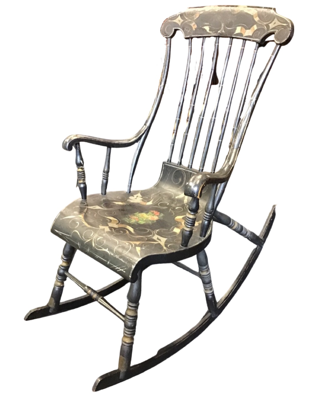 An unusual nineteenth century rocking chair in original painted finish with ribbon scrolling on