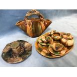 A Dunmore stoneware miniature two-piece coffee set on oval tray, decorated in green & brown