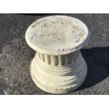 A circular composition stone garden plinth of fluted column form on moulded base. (17.5in x 16.