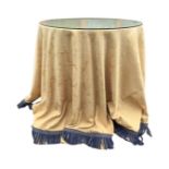 A circular contemporary occasional table, the lined foliate primrose damask cover with blue