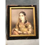 A fine Indian miniature, the waist portrait of a young lady delicately painted with gilt highlights,