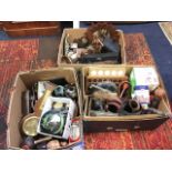 Three boxes of miscellaneous collectors items including coin trays, tin, wartime binoculars, leather