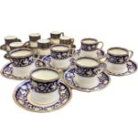 A Crown Staffordshire six-piece coffee set enamelled with griffon floral friezes framed by gilded