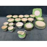 A Staffordshire soup set with bowls & covers on stand plates by Soho Pottery in the Queens Green