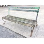 A 6ft wrought iron garden bench, the slatted back and seat with scrolled ends. (72in)
