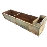 A rectangular 6ft galvanised trough with water supply compartment to end and flat rim. (72.5in)