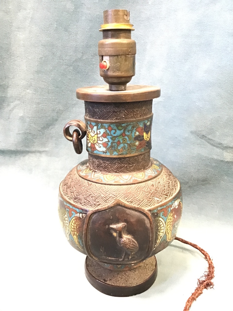 A nineteenth century bronze cloisonné vase converted to a tablelamp, with three bands of stylised