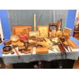 Miscellaneous treen including a concertina sewing box, trays, spindles, a tripod stand, boxes, a