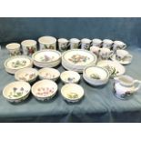 A collection of Portmeirion pottery in the Botanic Garden and Pomona patterns with bowls, plates,