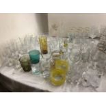 One hundred and fifty drinking glasses including tumblers, flutes, coloured, engraved, wine,