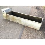 A 6ft rectangular galvanised riveted trough with tubular rim, having water supply compartment to