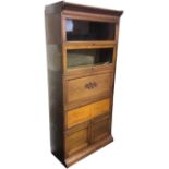 An oak globe wernicke style bureau bookcase in six stacking sections, the two glazed up-and-over