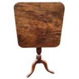 A nineteenth century mahogany snap-top occasional table, the square rounded top on turned column