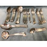 An Edwardian silver plated set of cutlery, the handles mostly engraved with the letter H,
