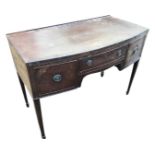 A bowfronted mahogany sideboard with crossbanded top above a central frieze drawer and shaped apron,