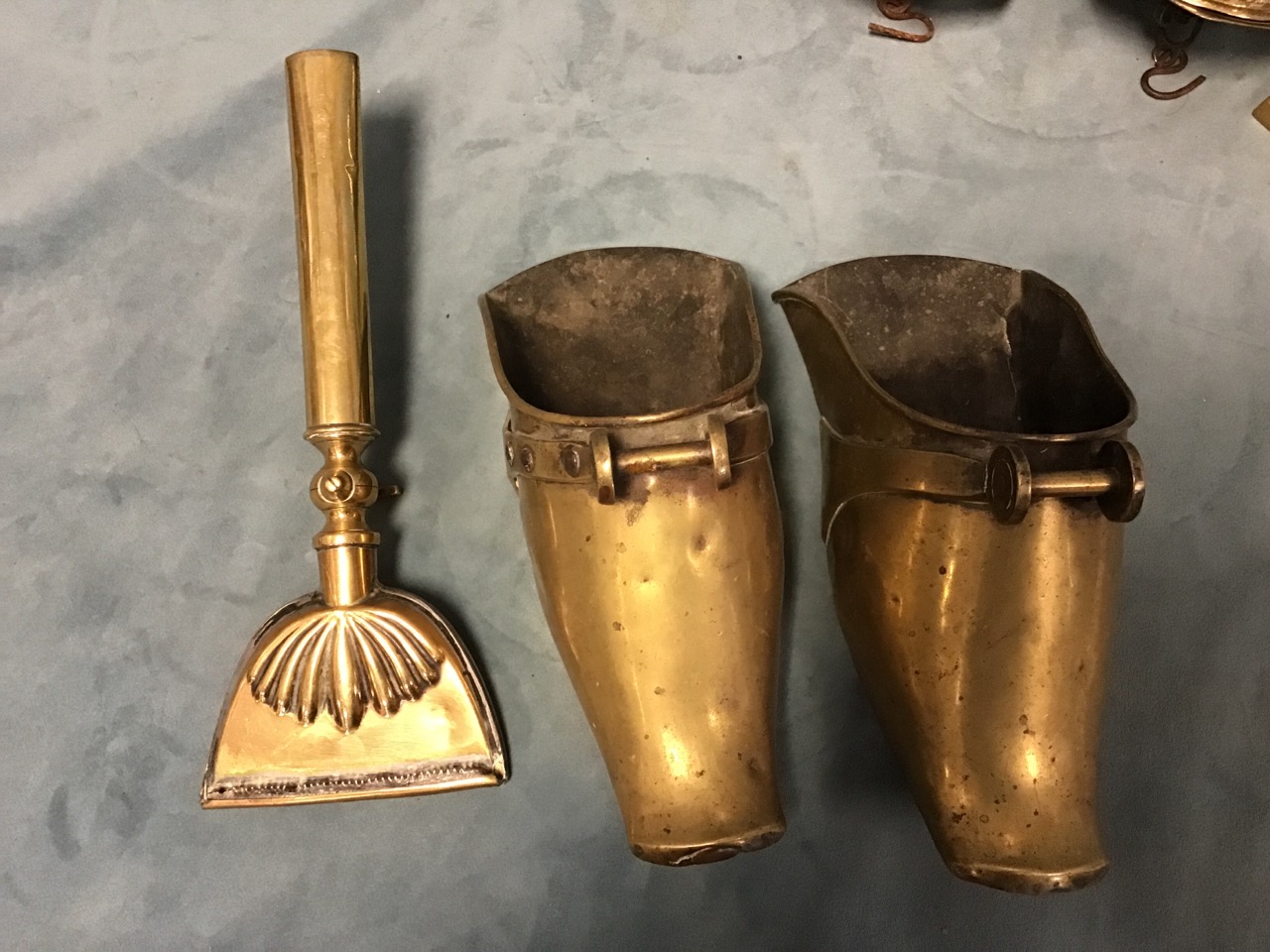 A pair of early brass stirrups of shoe form; a pair of weighted nineteenth century brass - Image 2 of 3