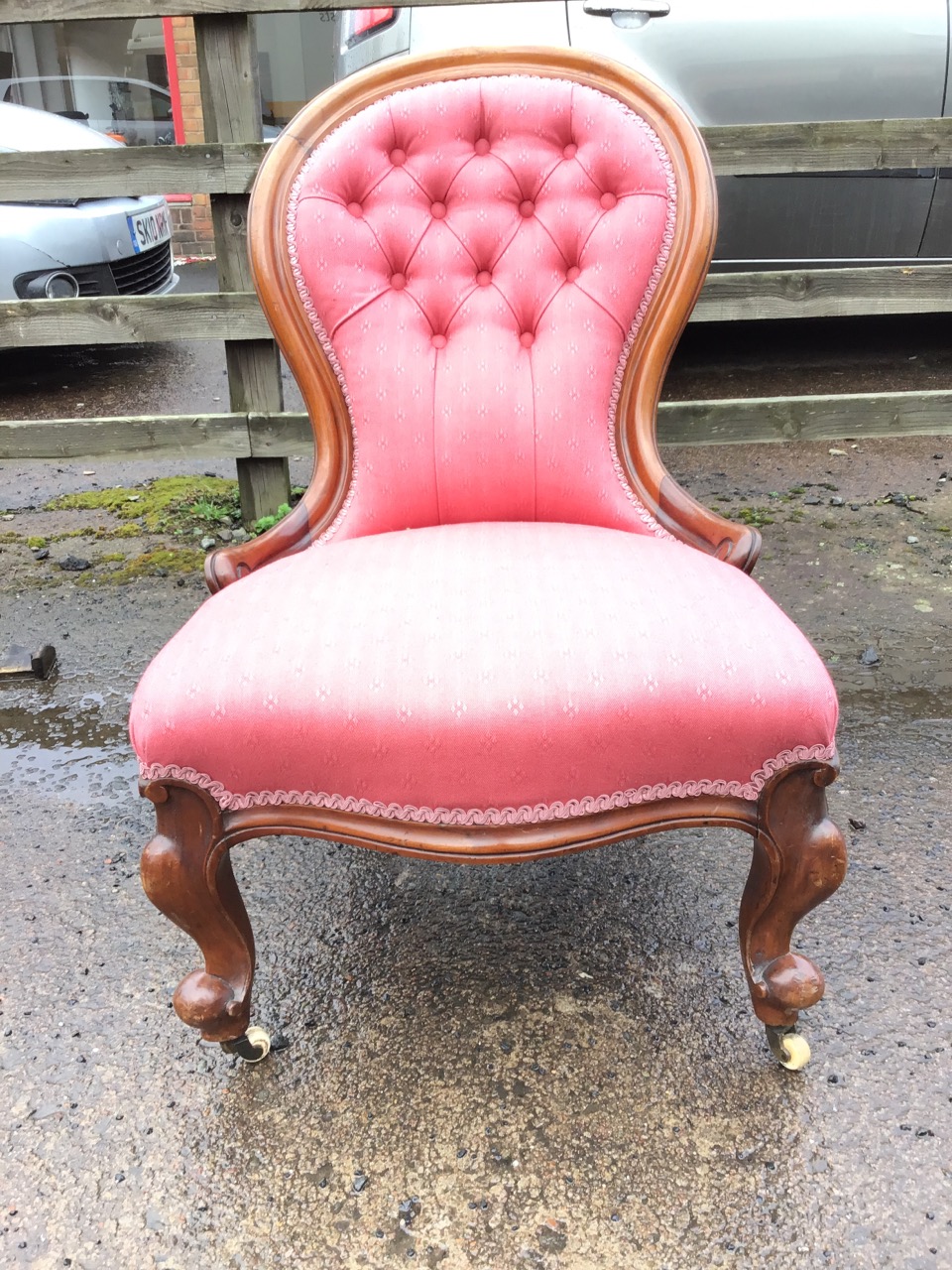 A Victorian mahogany spoonback chair with cushion moulded frame and scroll carved arms to button - Image 2 of 3