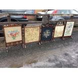 Five miscellaneous oak and mahogany firescreens with tapestry panels under glass - floral