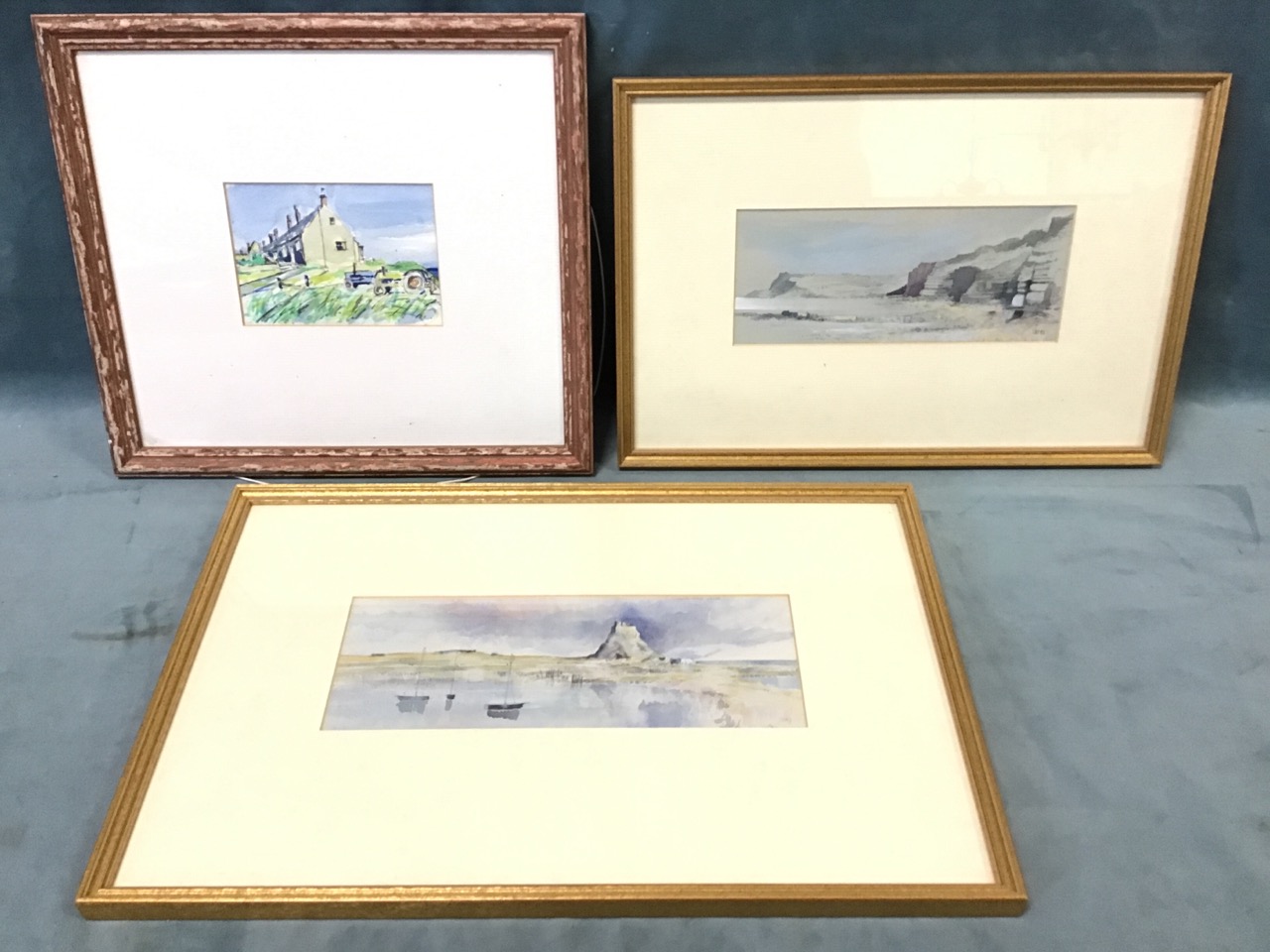 John Hutchinson, watercolour, Lindisfarne coastal view, signed with monogram, labelled to verso,