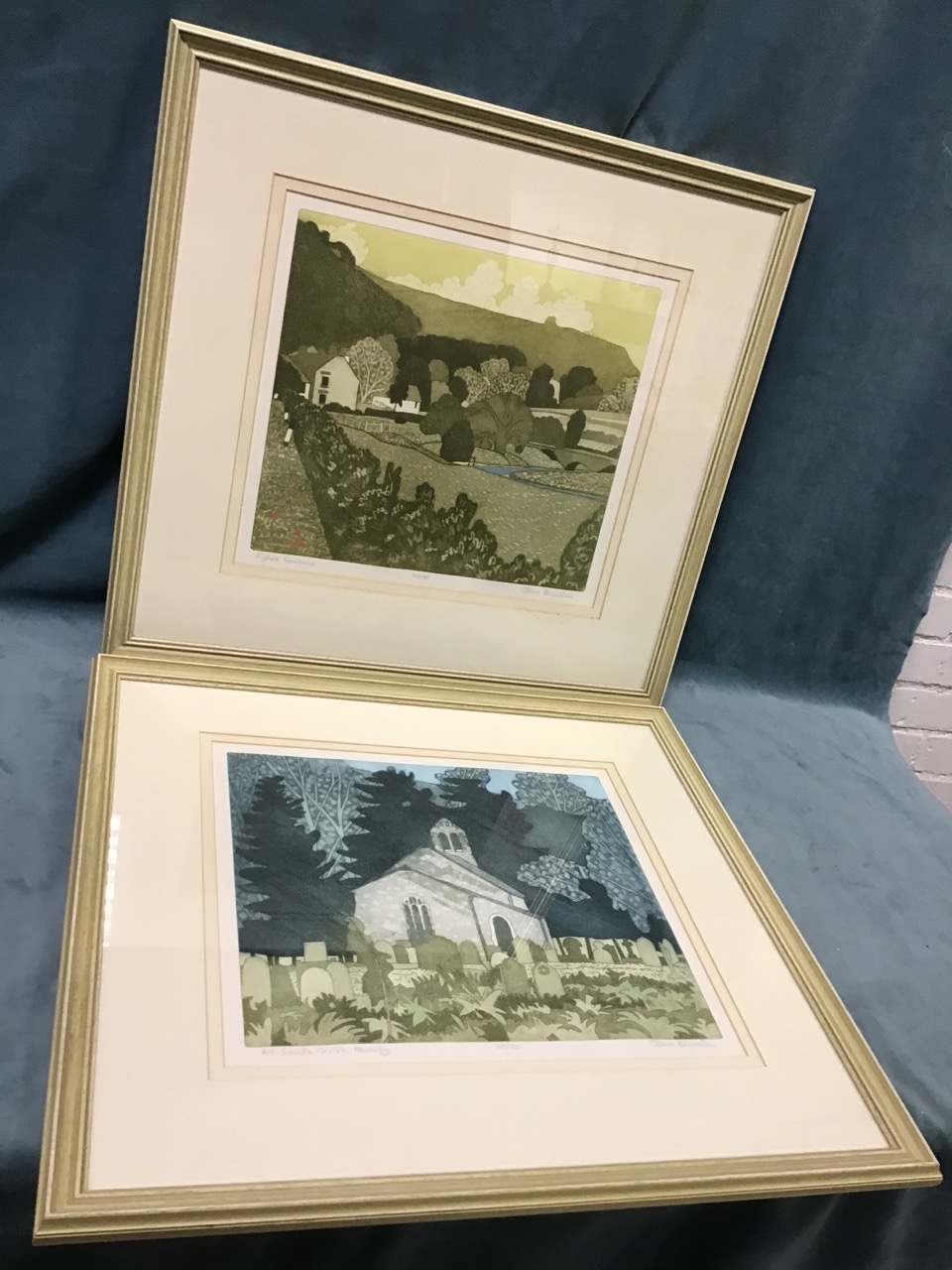 John Brunsden, coloured etchings, a pair, landscapes titled Rydale Farmhouse and All Saints Church