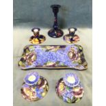 A Maling rectangular tray and matching candlesticks decorated with purple peony flowers on pale blue