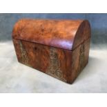 A late Victorian domed top walnut stationary box with pierced engraved scrolled brass mounts, the