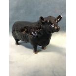 A Beswick black bull with brown hoofs - approved by The Aberdeen Angus Cattle Society gilt printed