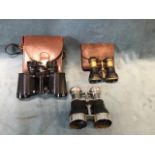 A leather cased set of Hilschke Rathenow Genira field glasses; a chromed set of binoculars with